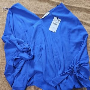 Gorgeous blue flowy top